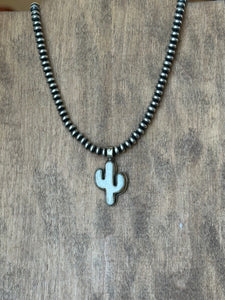 Small bone cactus pendant