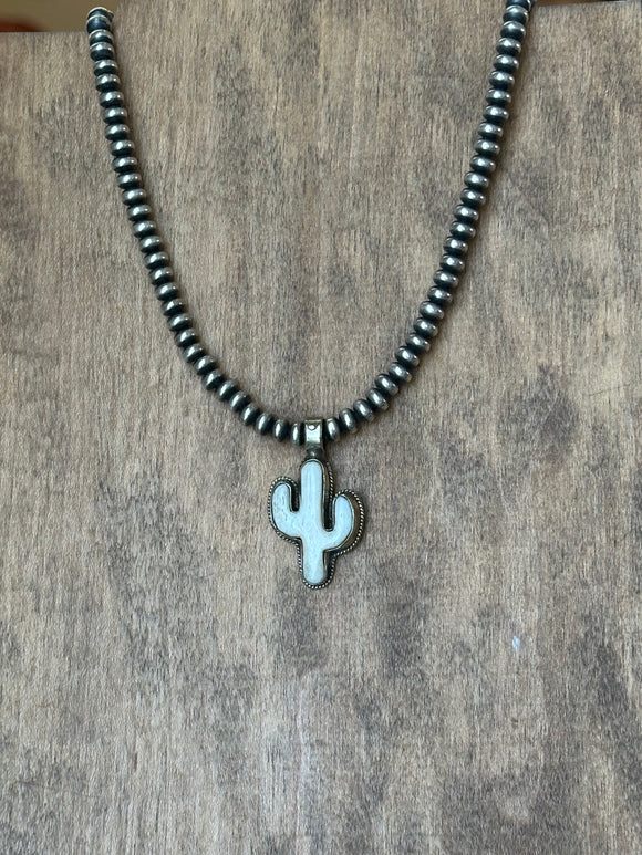 Small bone cactus pendant